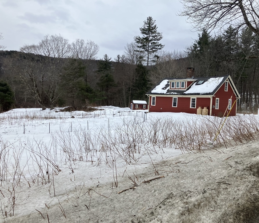 103 East Hawley Road Hawley, MA 01339 - Photo 3 of 34 a view of a house with a yard covered in snow