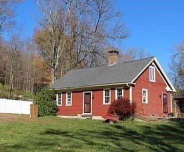 103 East Hawley Road Hawley, MA 01339 - Photo 32 of 34 a front view of a house with a yard and garage