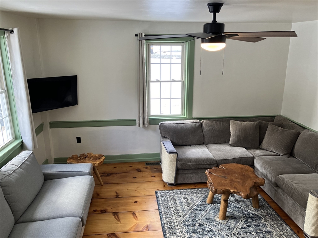 103 East Hawley Road Hawley, MA 01339 - Photo 7 of 34 a living room with furniture and a flat screen tv