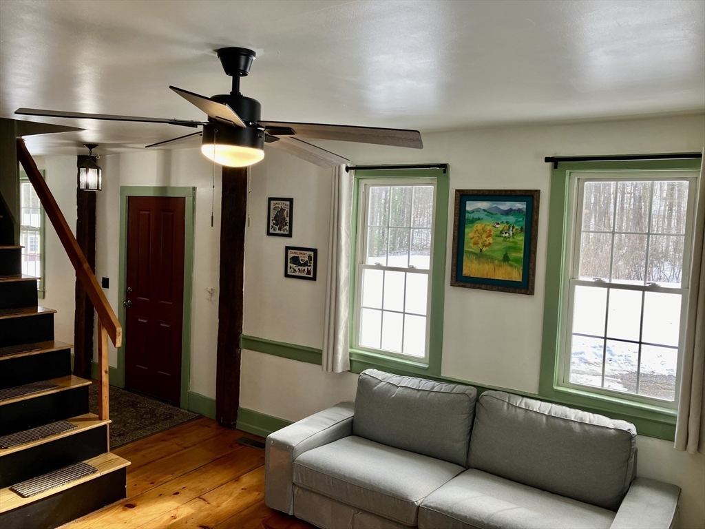 103 East Hawley Road Hawley, MA 01339 - Photo 8 of 34 a living room with furniture and a window