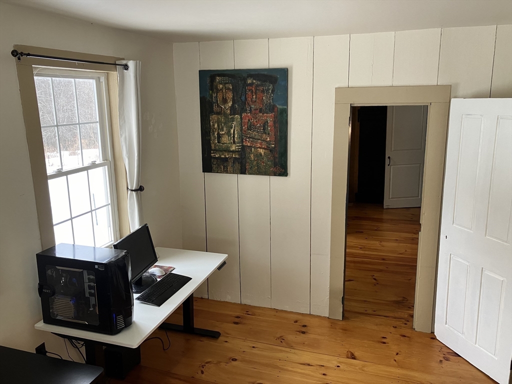 103 East Hawley Road Hawley, MA 01339 - Photo 10 of 34 a room with wooden floor and windows