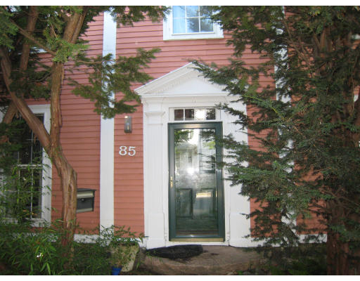 a aerial view of a house with a yard