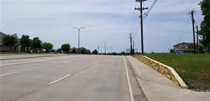 a view of a terrace with a yard