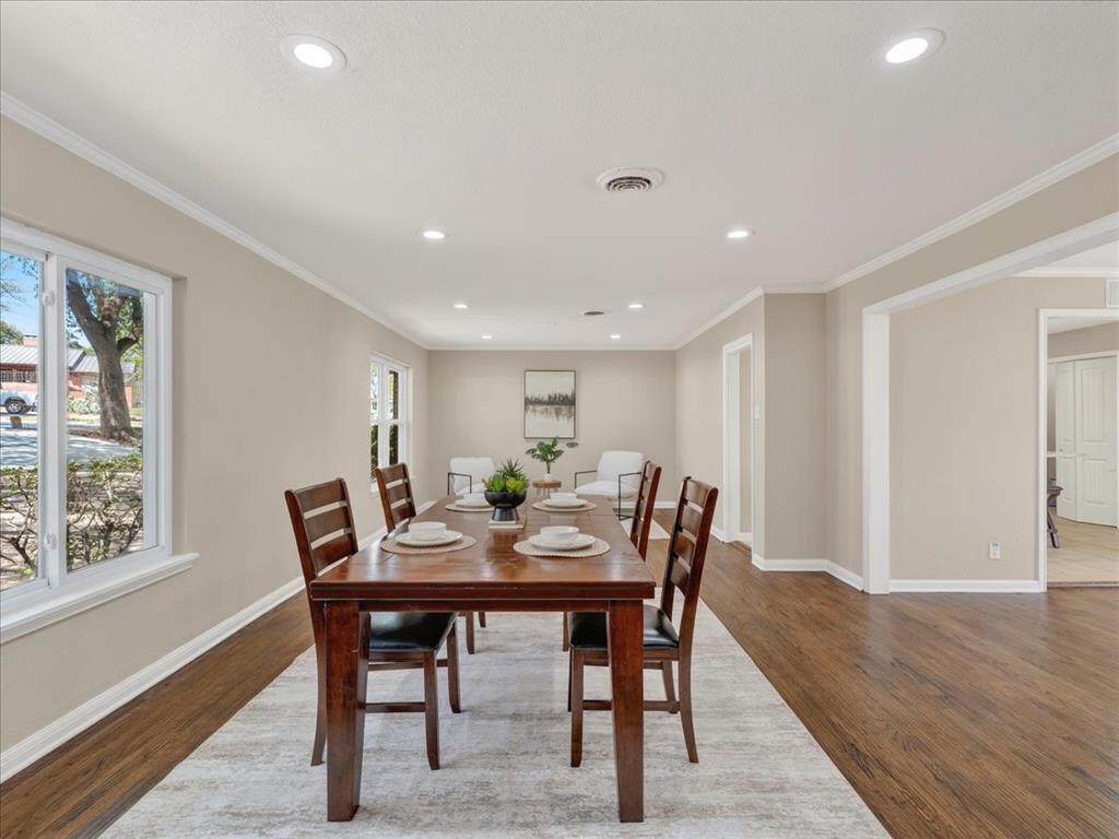 3863 Clayton Road East Fort Worth, TX 76116 - Photo 7 of 39 a view of a dining room with furniture window and wooden floor