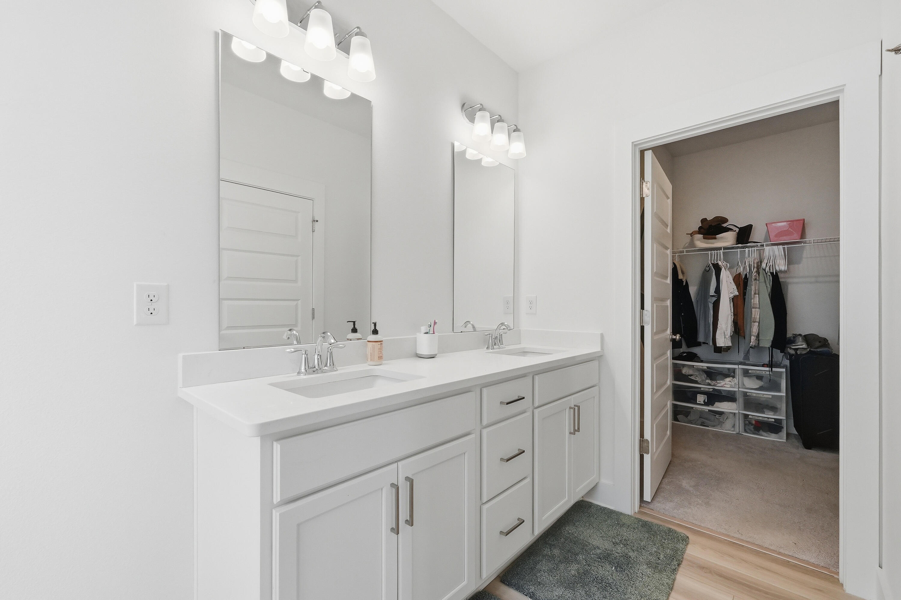 125 Blooming Cove Crestview, FL 32539 - Photo 16 of 55 a bathroom with a sink a vanity and mirror