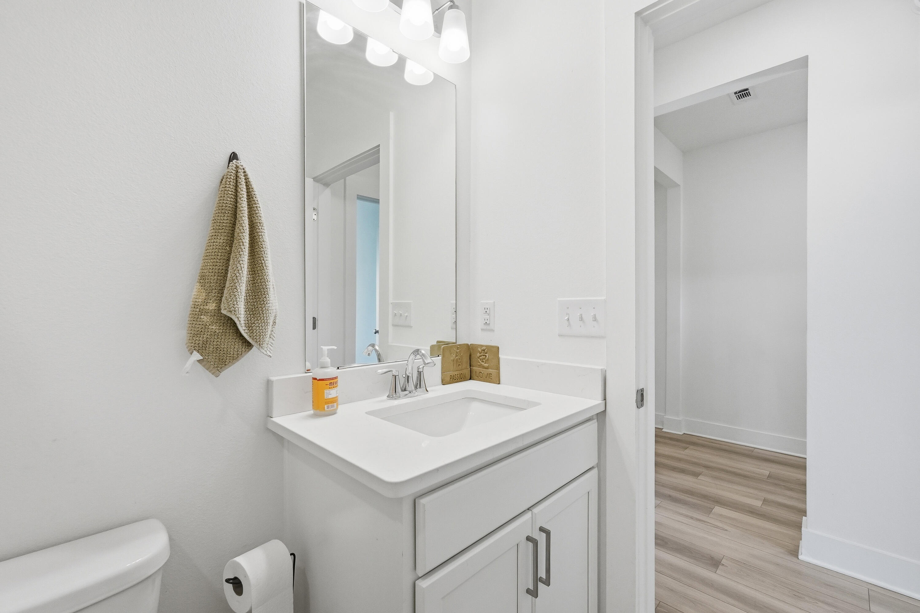 125 Blooming Cove Crestview, FL 32539 - Photo 23 of 55 a bathroom with a sink and a mirror