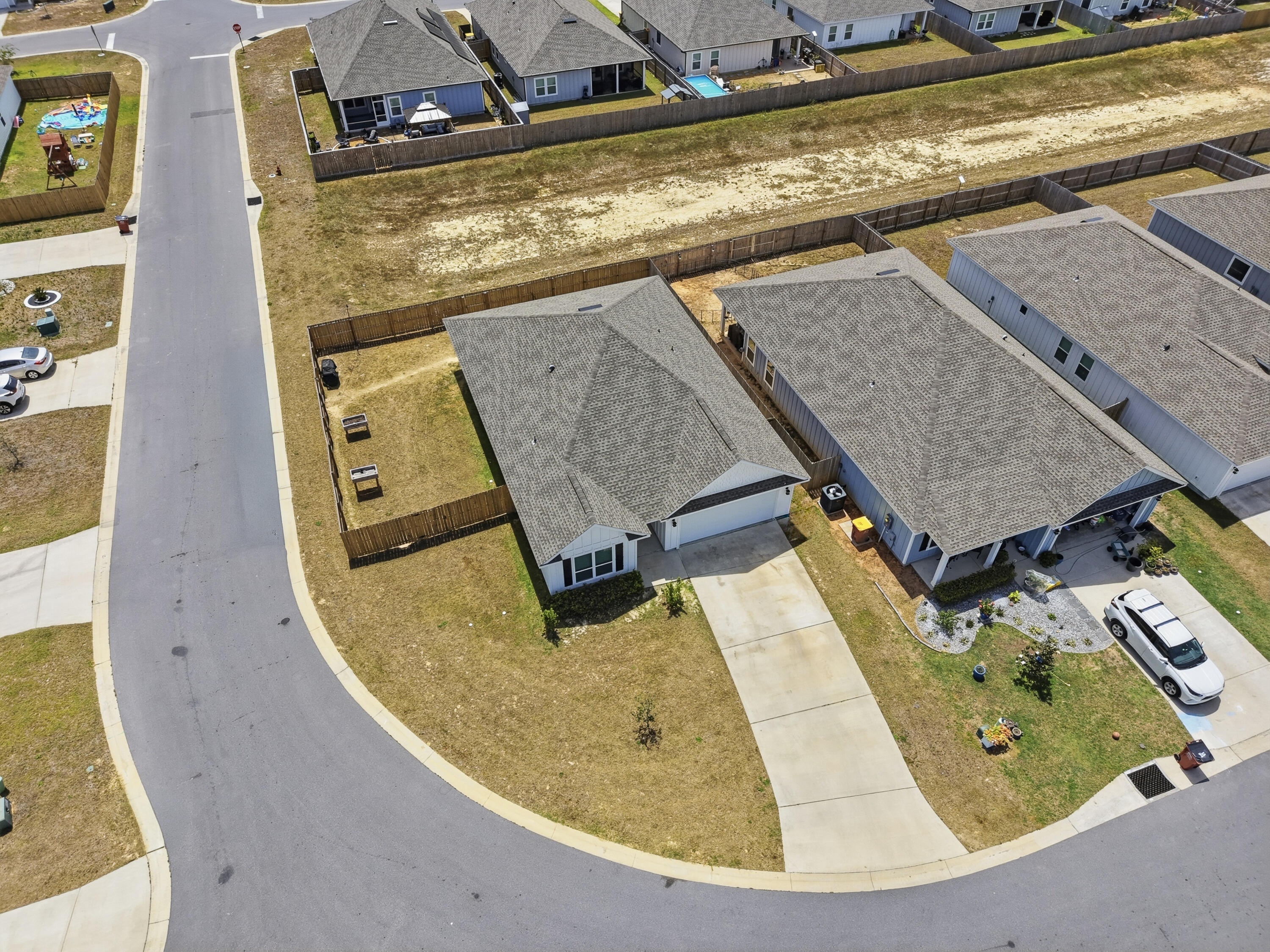 125 Blooming Cove Crestview, FL 32539 - Photo 46 of 55 an aerial view of a house with swimming pool