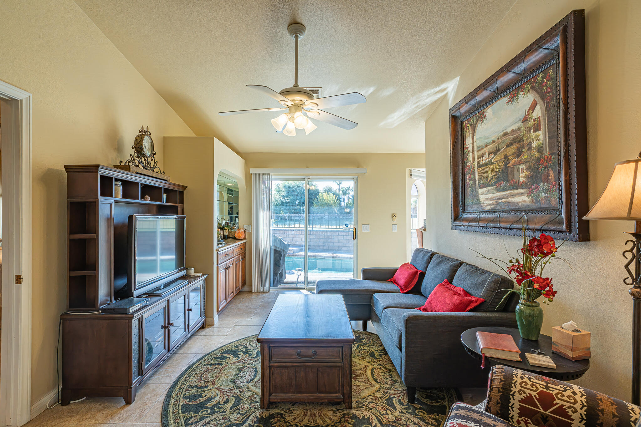 79815 Horseshoe Road La Quinta, CA 92253 - Photo 12 of 33 a living room with furniture and a flat screen tv