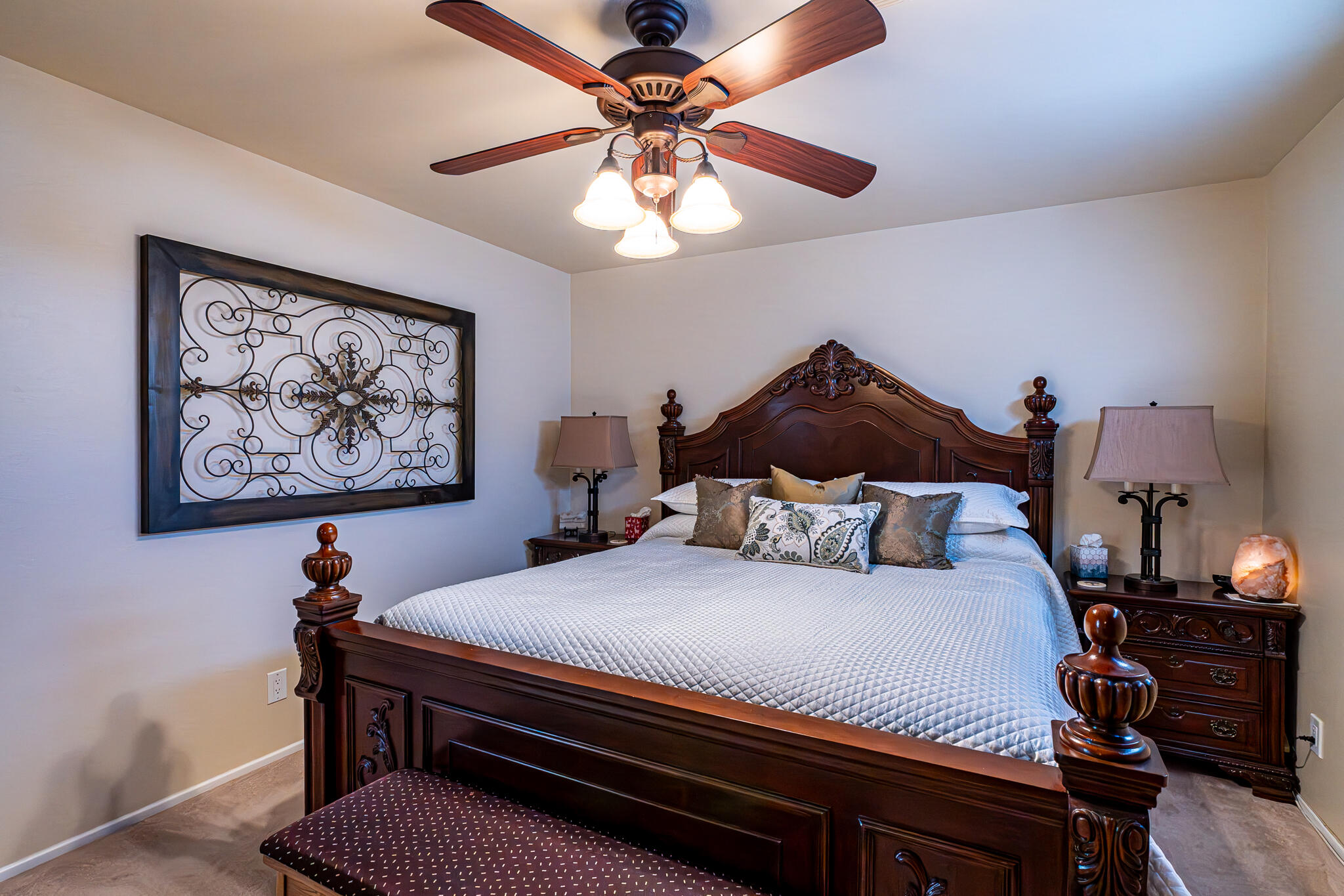 79815 Horseshoe Road La Quinta, CA 92253 - Photo 20 of 33 a bedroom with a bed and a chandelier