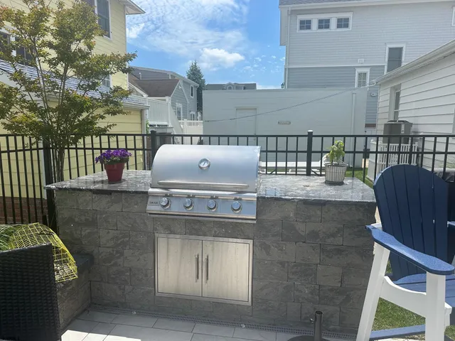 a view of a chairs and tables in the patio
