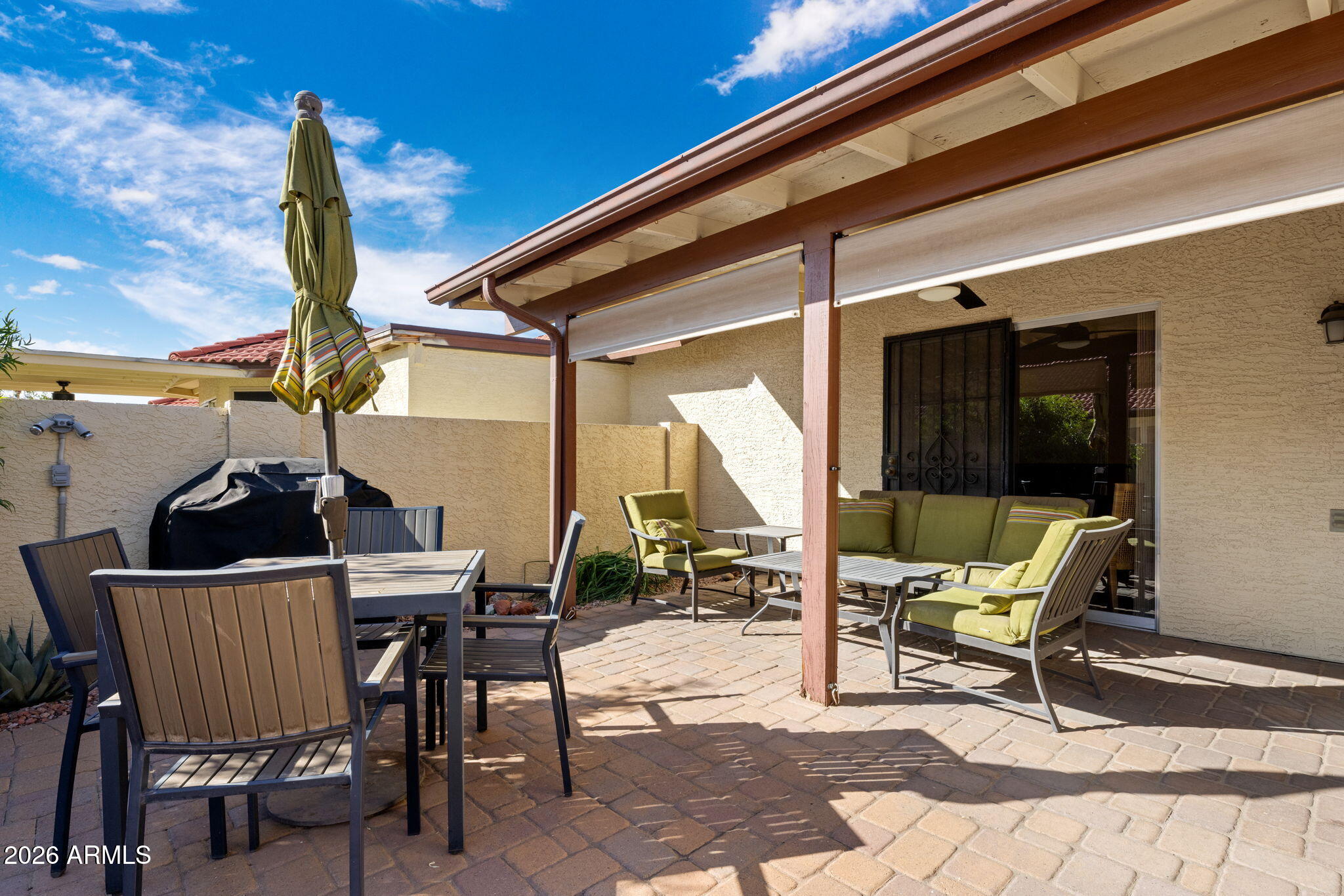 542 South Higley Road, Unit 54 Mesa, AZ 85206 - Photo 19 of 29 a view of a chairs and table in the balcony
