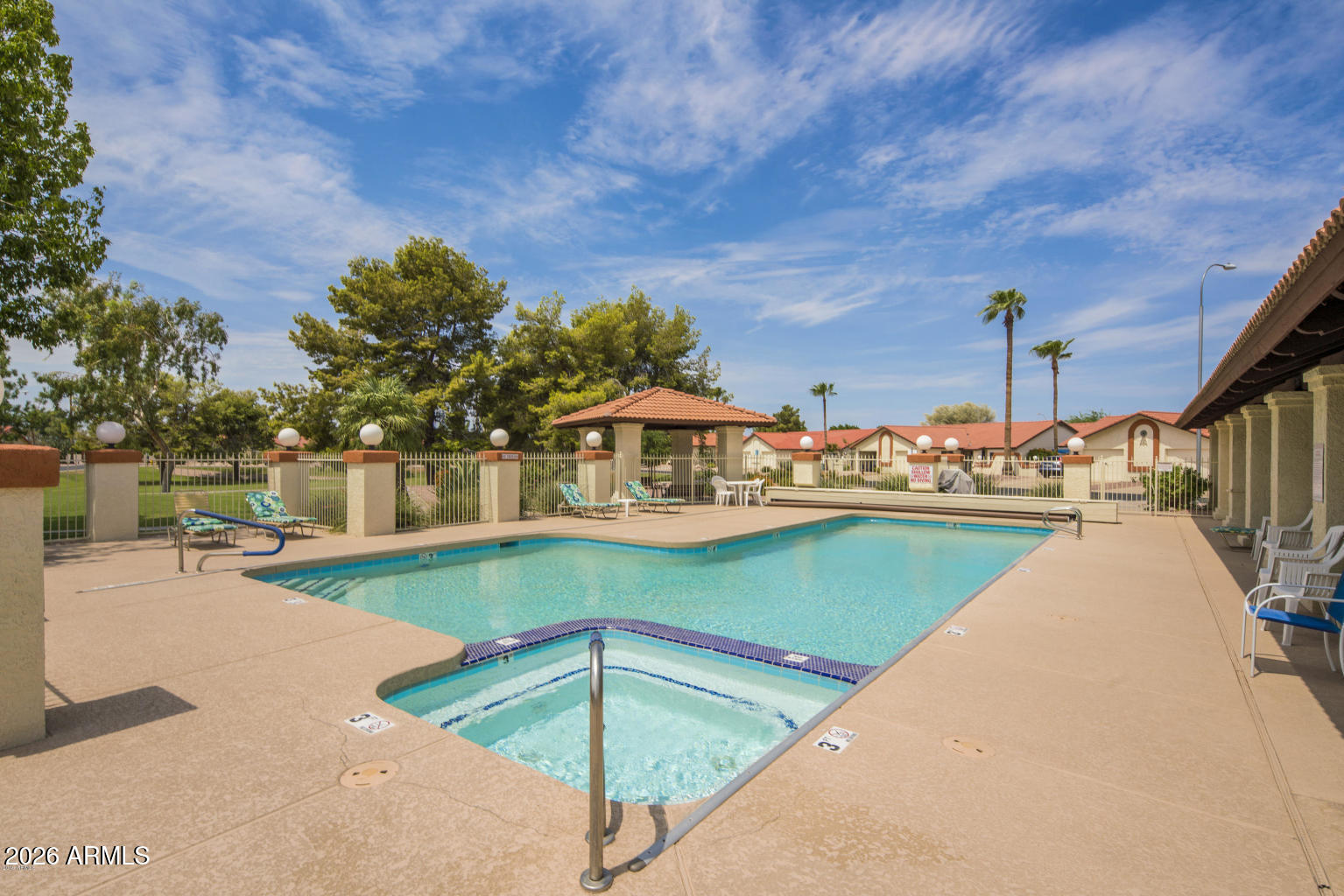 542 South Higley Road, Unit 54 Mesa, AZ 85206 - Photo 23 of 29 a view of a swimming pool with a lake view