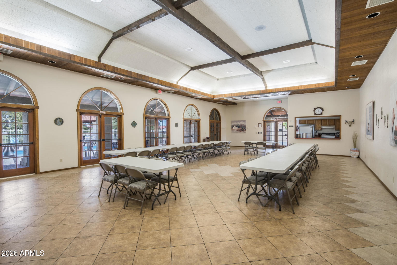 542 South Higley Road, Unit 54 Mesa, AZ 85206 - Photo 28 of 29 a outdoor space with lots of white furniture