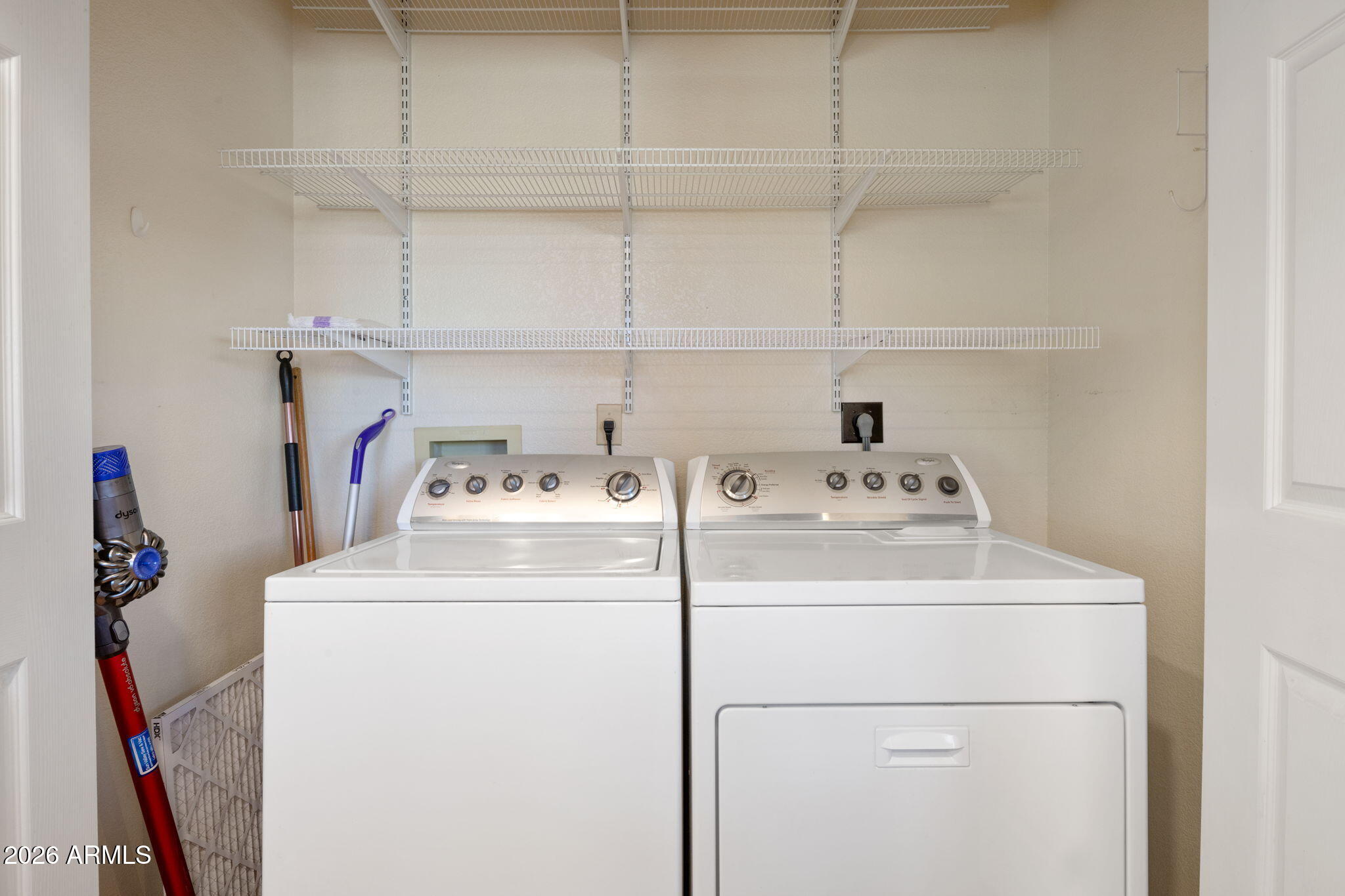 542 South Higley Road, Unit 54 Mesa, AZ 85206 - Photo 8 of 29 a utility room with dryer and washer