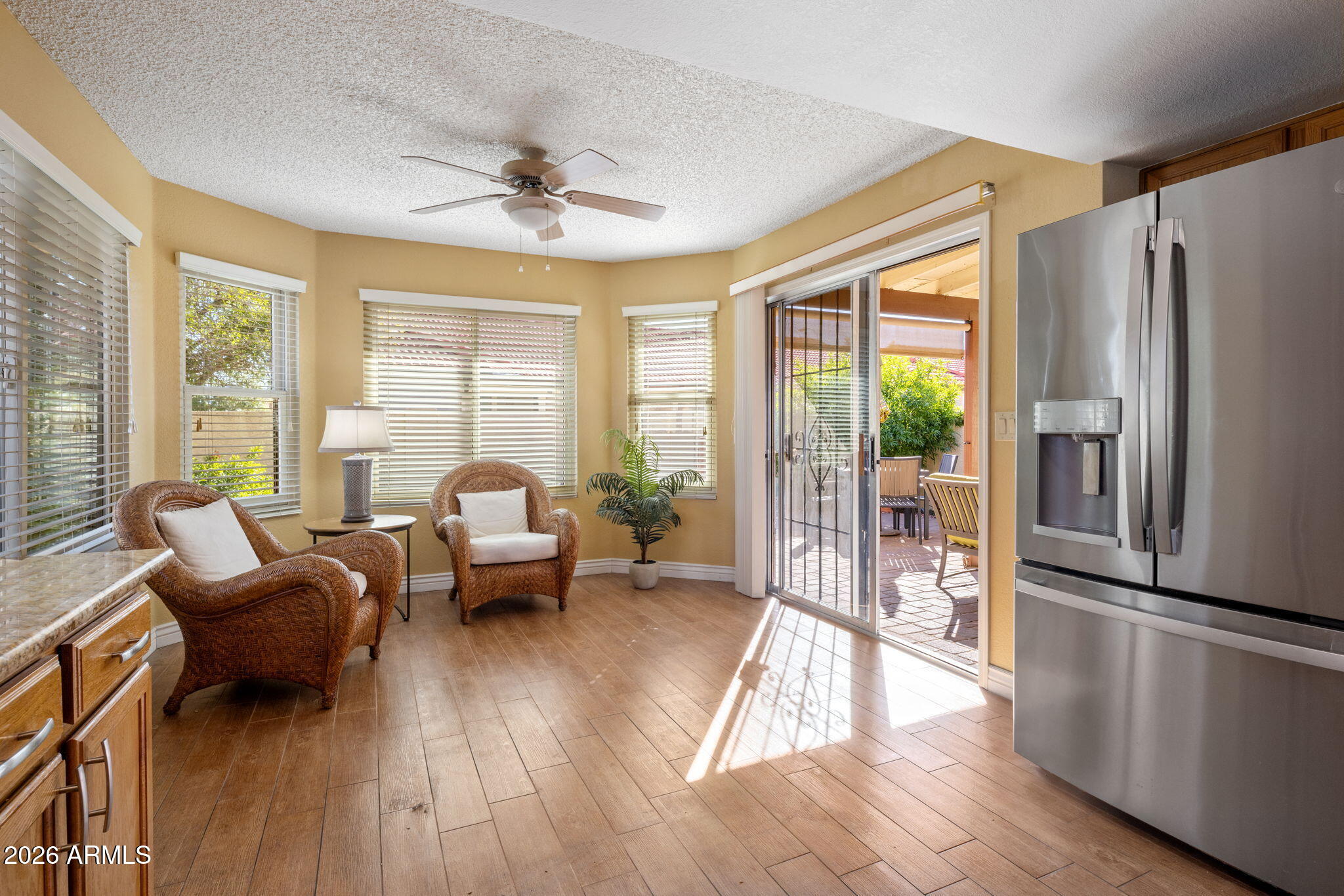 542 South Higley Road, Unit 54 Mesa, AZ 85206 - Photo 9 of 29 a living room with furniture and a large window