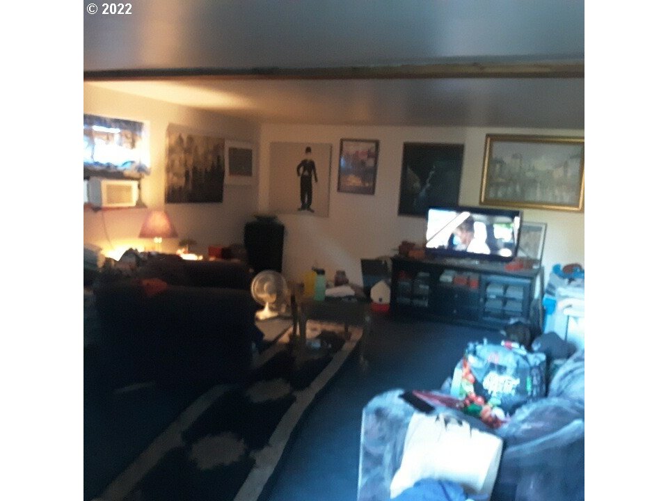 1223 Southeast Barnes Road Gresham, OR 97080 - Photo 7 of 12 a living room with furniture