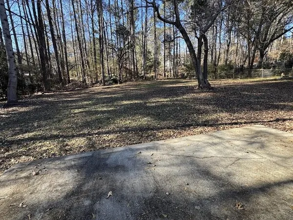 a view of road with trees