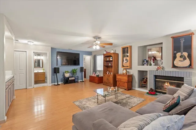 a bedroom with a bed dresser and a window