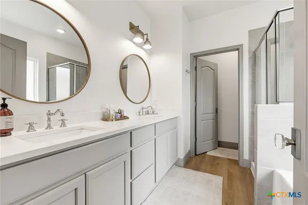 a view of a chair and table in the balcony