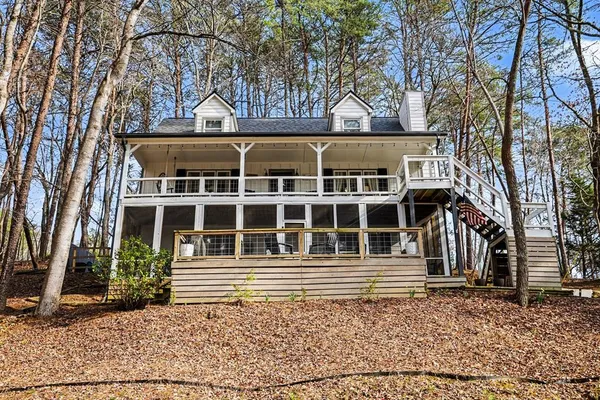a house with trees in front of it