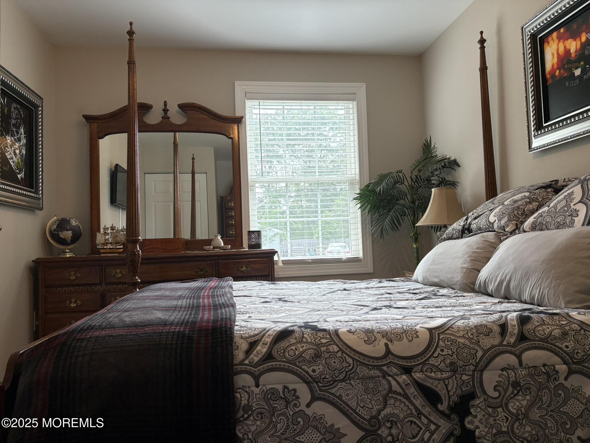 650 Chelsea Street Forked River, NJ 08731 - Photo 23 of 82 a bedroom with a bed and a window