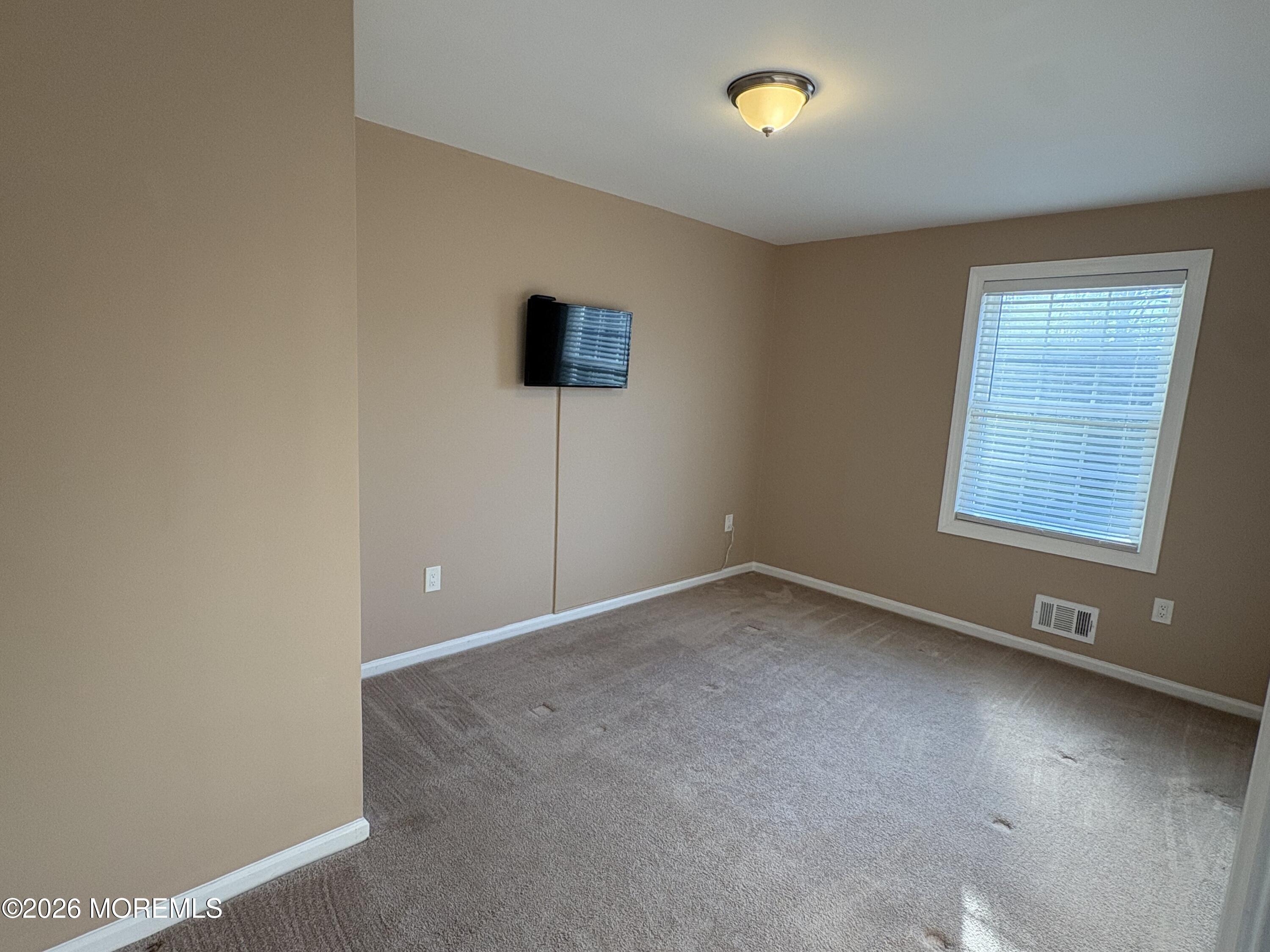 650 Chelsea Street Forked River, NJ 08731 - Photo 62 of 82 an empty room with a empty space and a window