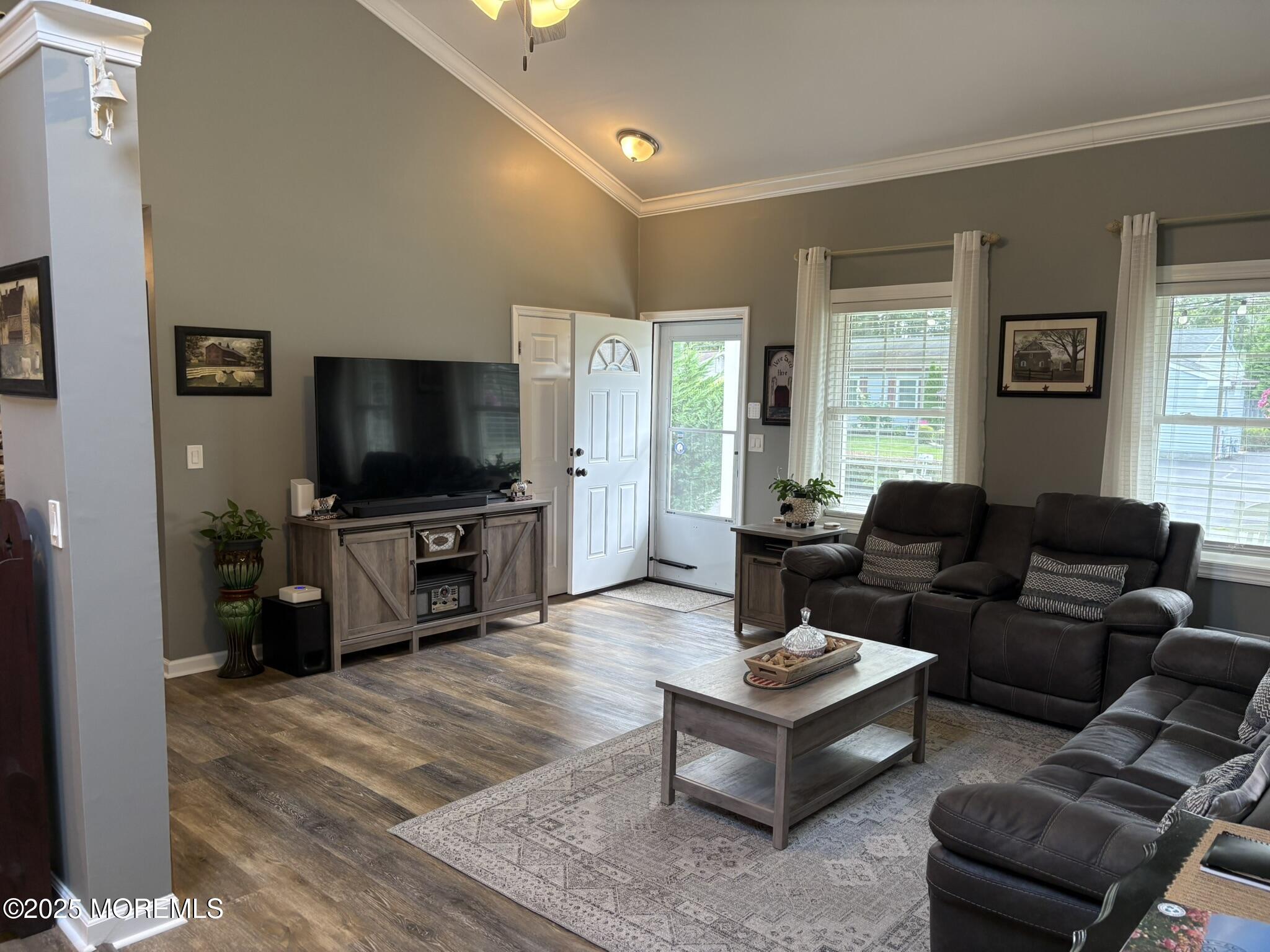 650 Chelsea Street Forked River, NJ 08731 - Photo 80 of 82 a living room with furniture and a flat screen tv