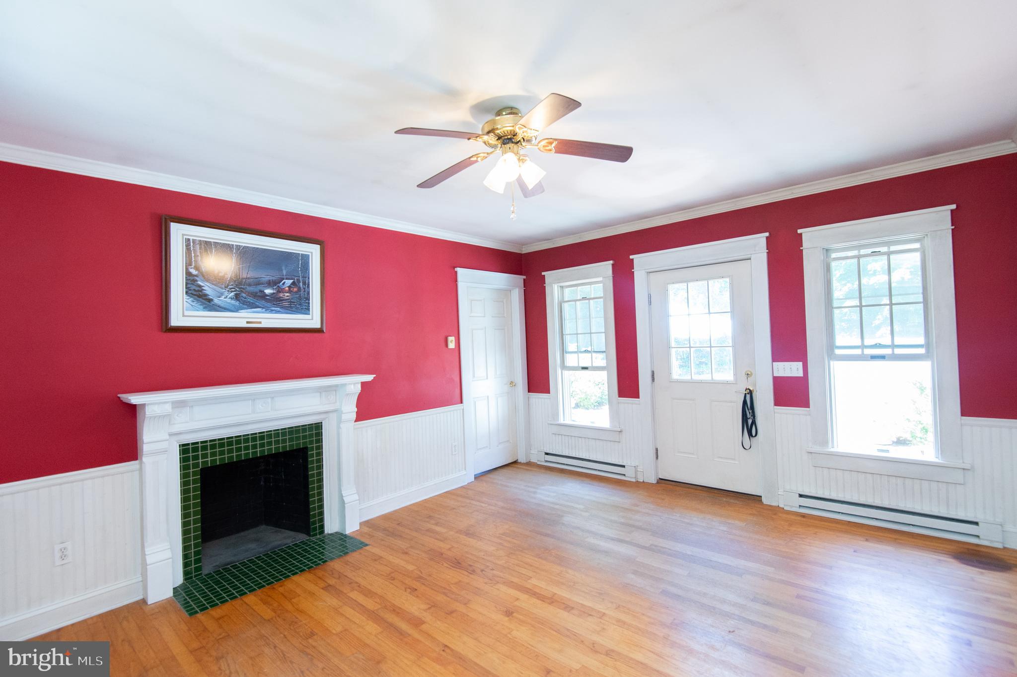 23130 Sparks Road Ridgely, MD 21660 - Photo 23 of 74 a view of an empty room with window and fireplace