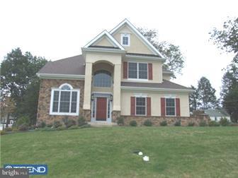 236 North Highland Road Springfield, PA 19064 - Photo 3 of 12 a front view of a house with a garden