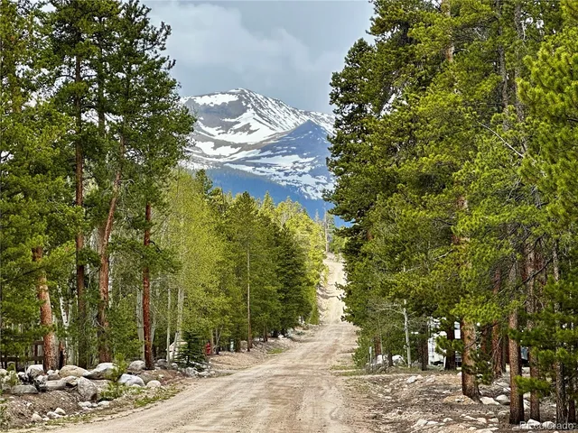 a view of a backyard of the house