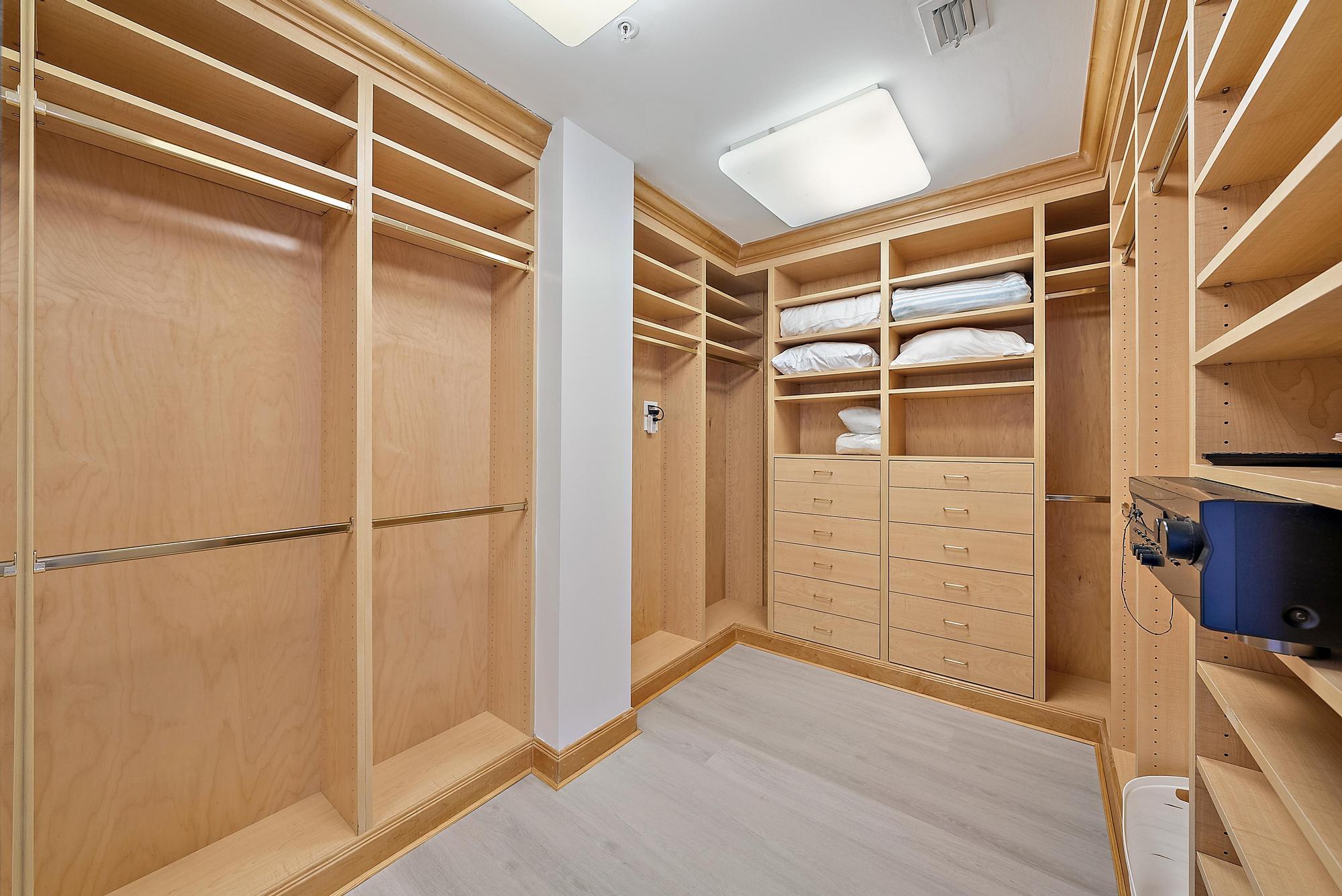 2070 North Ocean Boulevard, Unit PH4 Boca Raton, FL 33431 - Photo 26 of 46 a view of an empty walk in closet