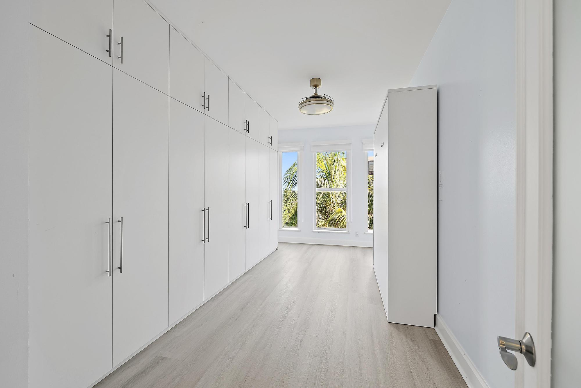 2070 North Ocean Boulevard, Unit PH4 Boca Raton, FL 33431 - Photo 34 of 46 a view of an entryway with wooden floor