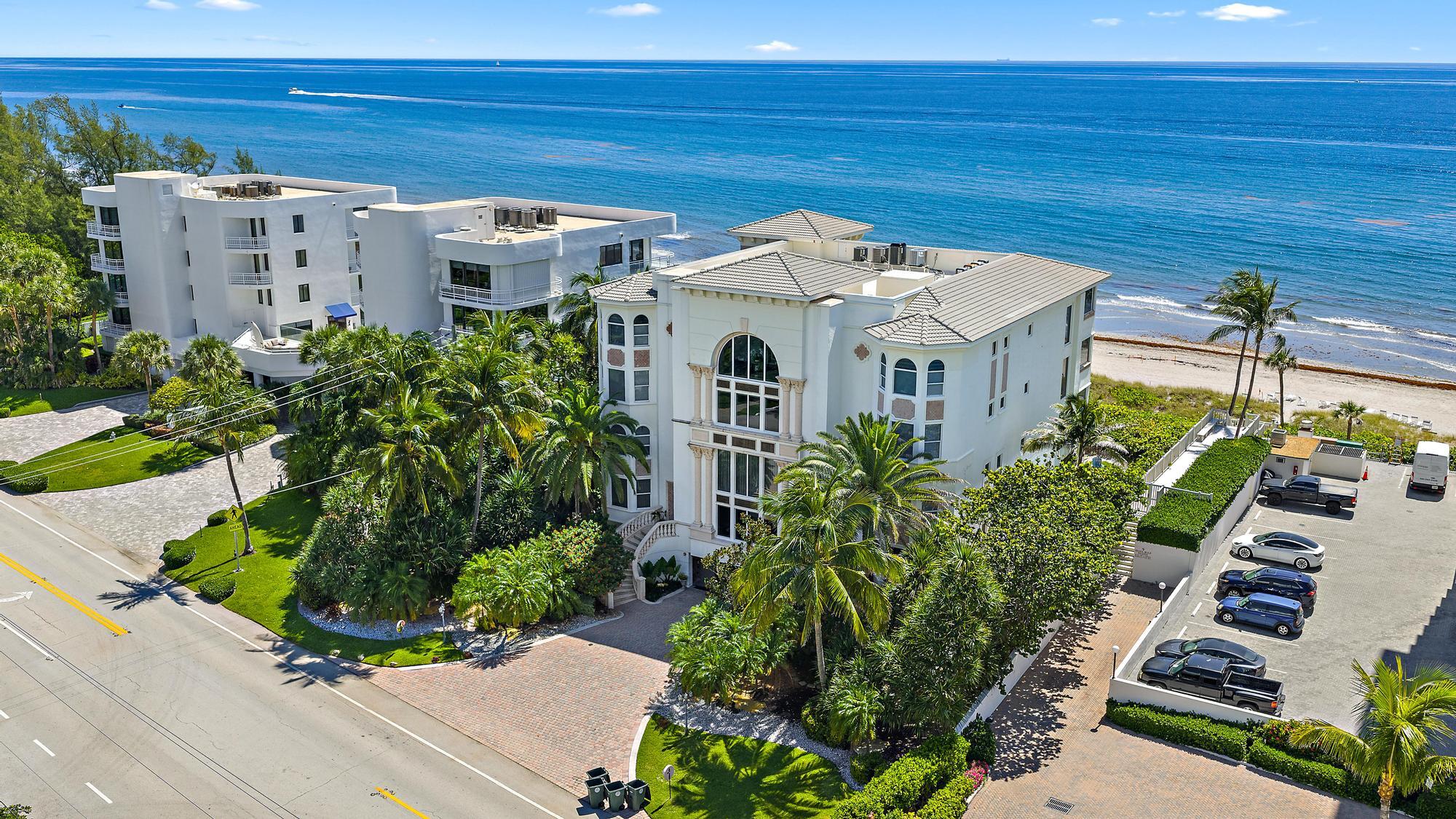 2070 North Ocean Boulevard, Unit PH4 Boca Raton, FL 33431 - Photo 38 of 46 a front view of a house with a garden