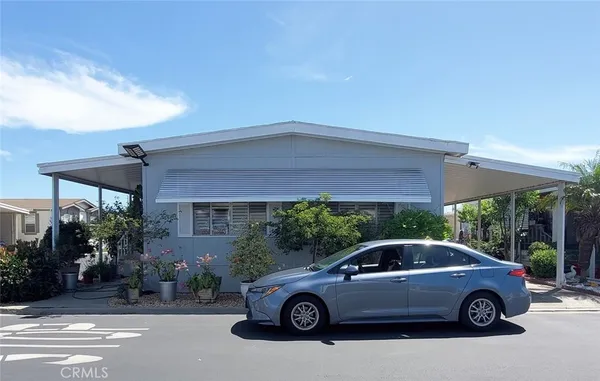 a car parked in front of a house