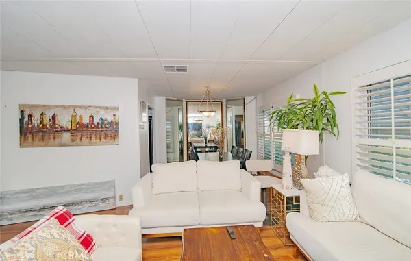 a living room with furniture and a table