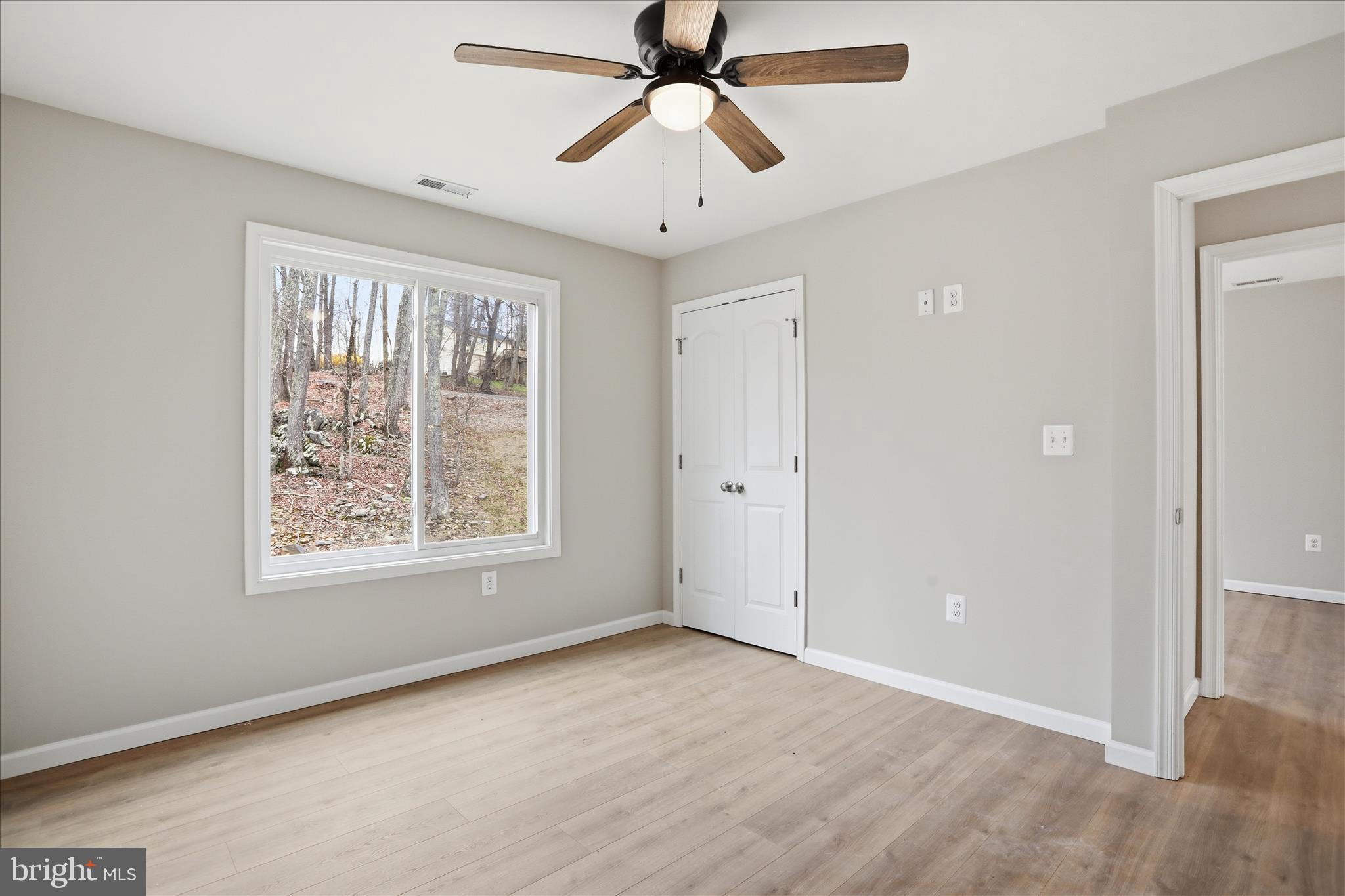 490 Black Twig Road Linden, VA 22642 - Photo 25 of 44 a view of an empty room with a window