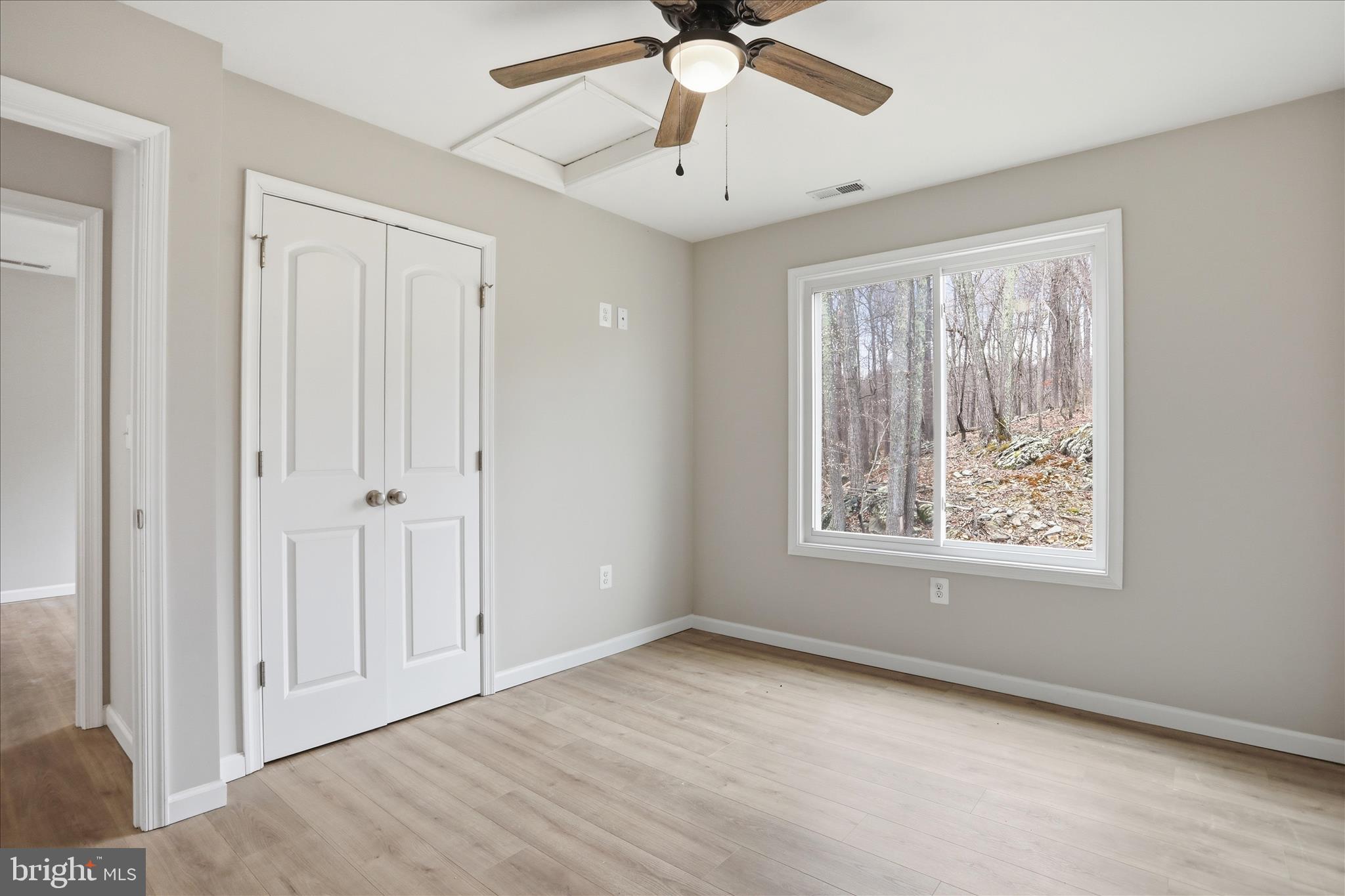 490 Black Twig Road Linden, VA 22642 - Photo 27 of 44 a view of an empty room with a window