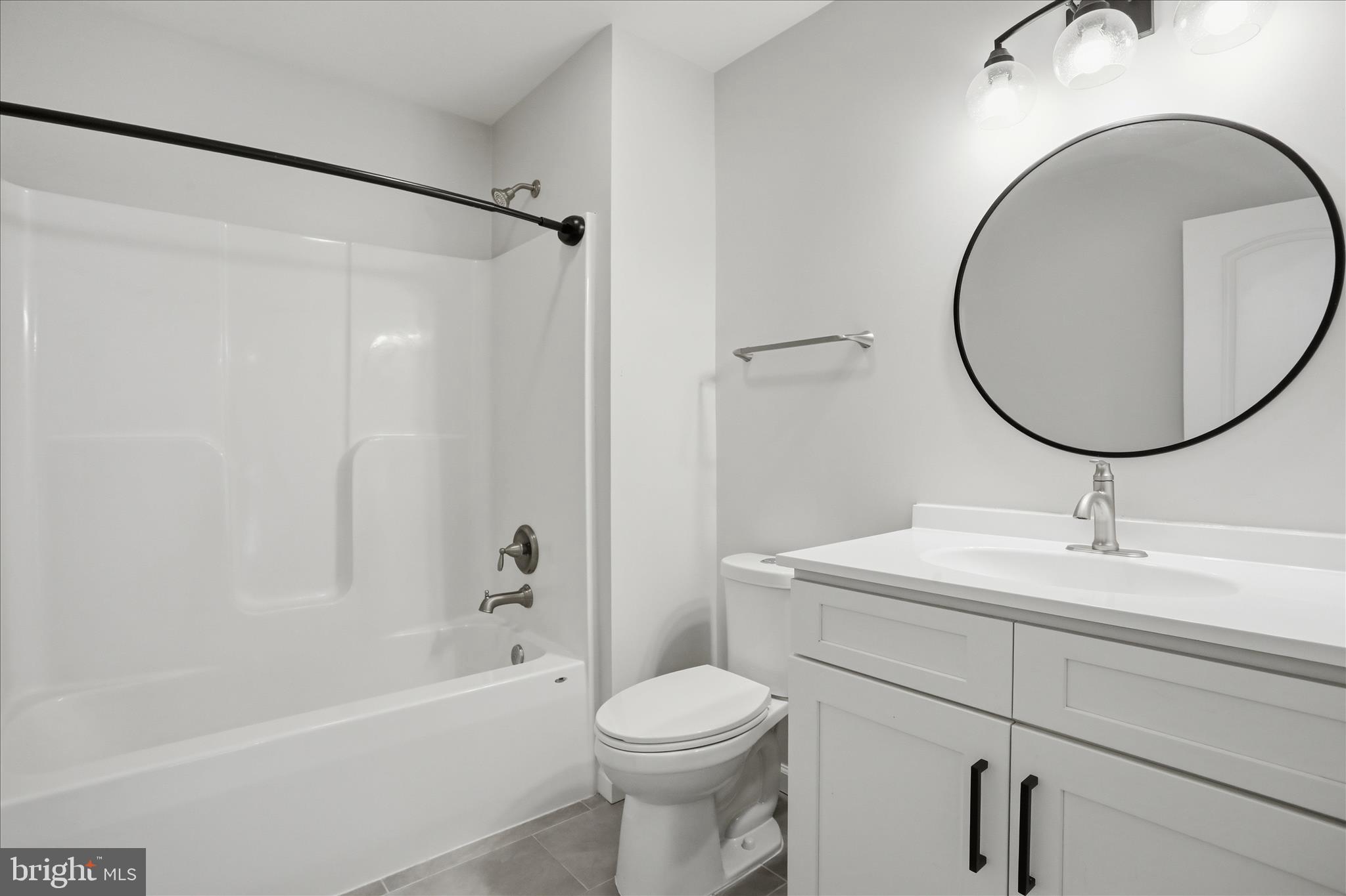 490 Black Twig Road Linden, VA 22642 - Photo 29 of 44 a bathroom with a sink toilet and shower