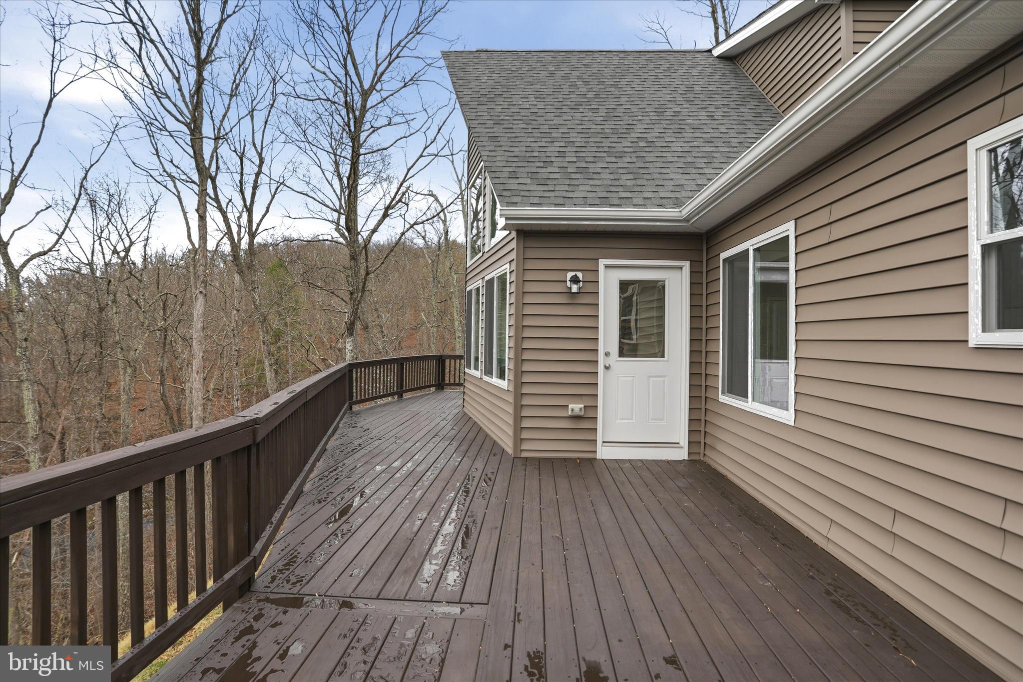 490 Black Twig Road Linden, VA 22642 - Photo 31 of 44 a view of a house with wooden deck