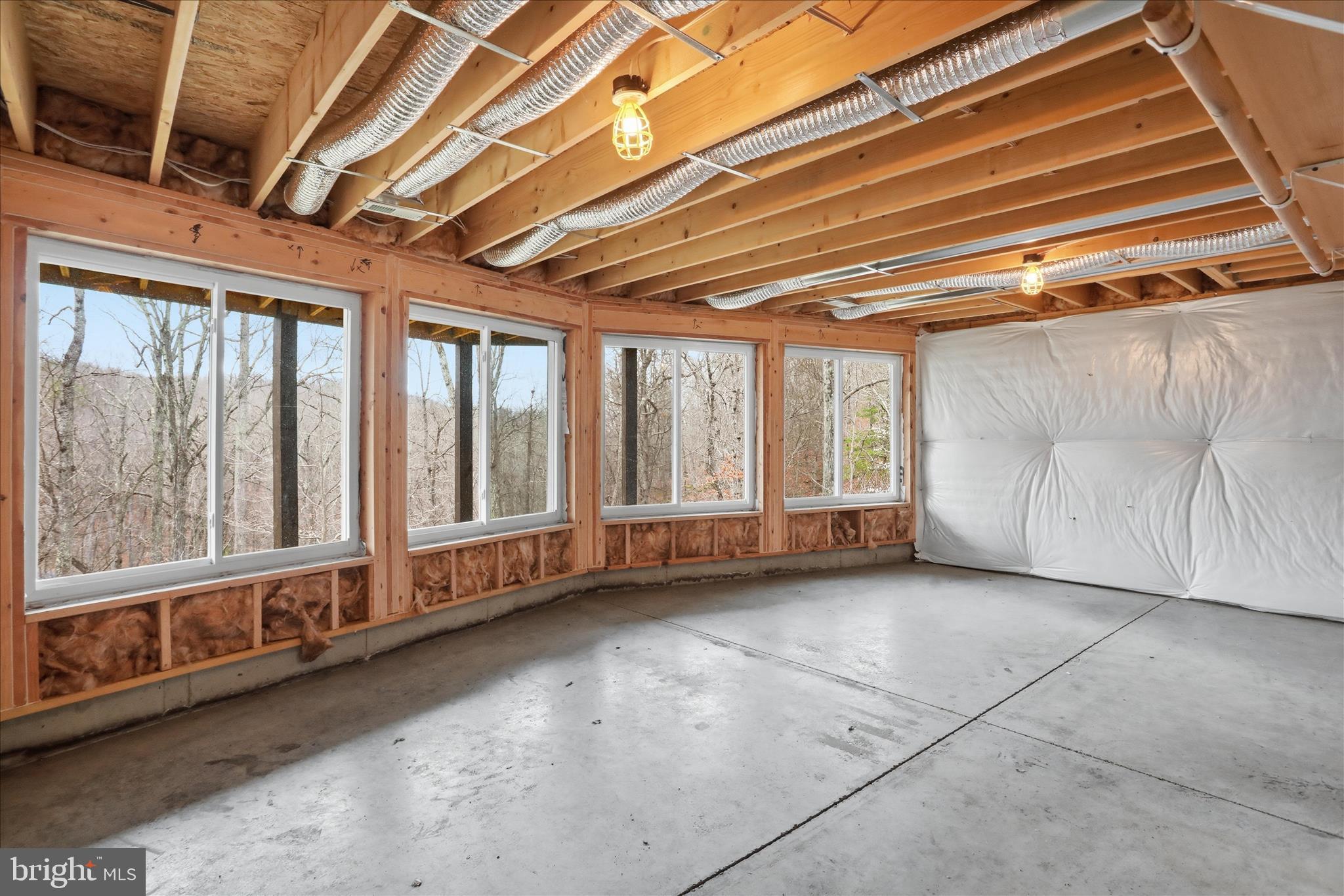 490 Black Twig Road Linden, VA 22642 - Photo 34 of 44 a view of an empty room with a window