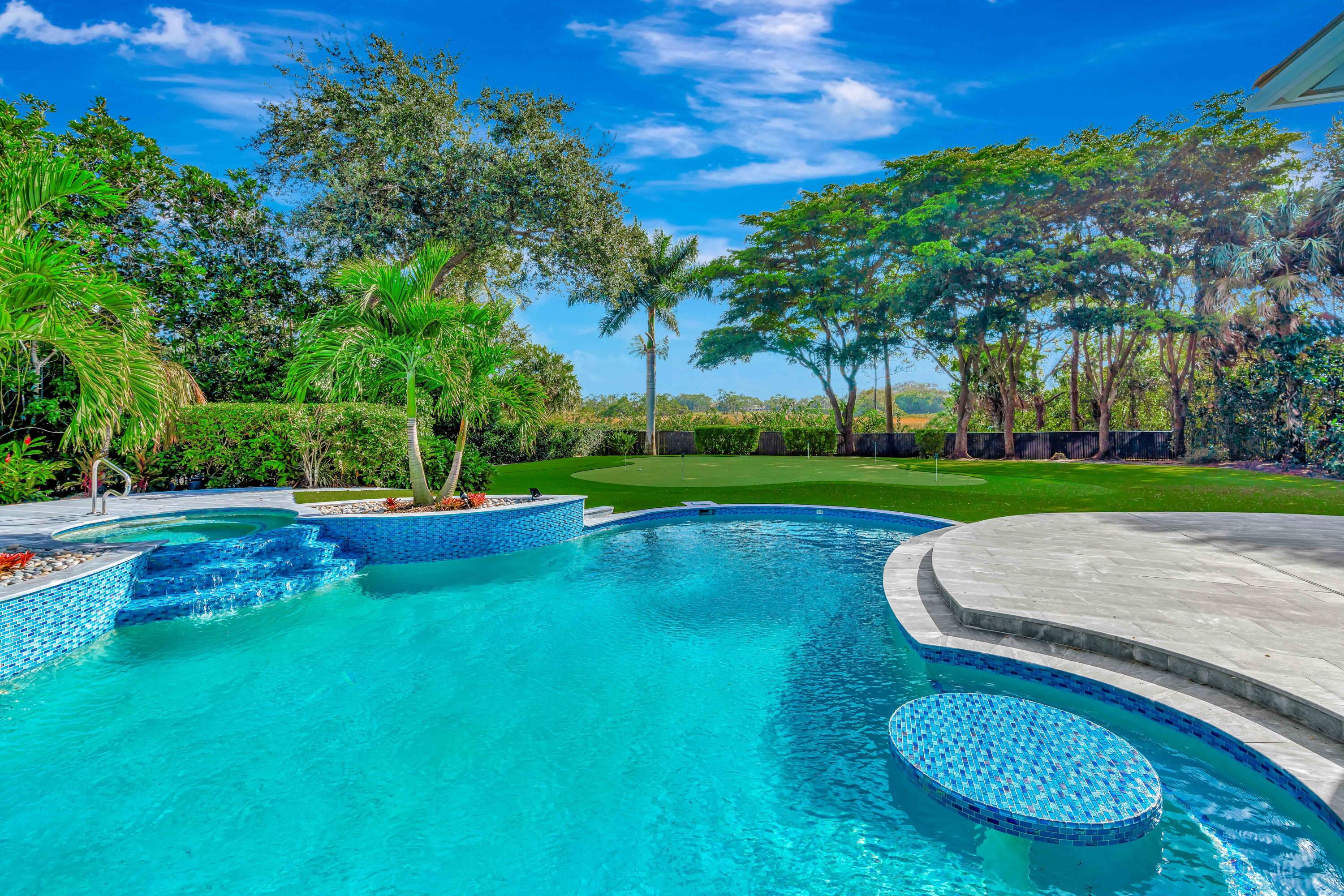 7801 Old Marsh Road Palm Beach Gardens, FL 33418 - Photo 44 of 58 Picnic Table in Pool