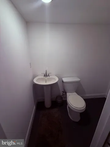 a bathroom with a sink and a toilet