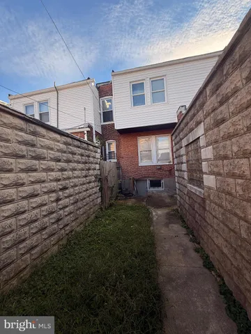 a front view of a building with a garage
