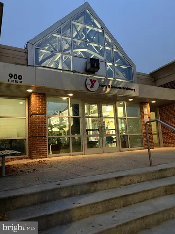 a view of a building with a street