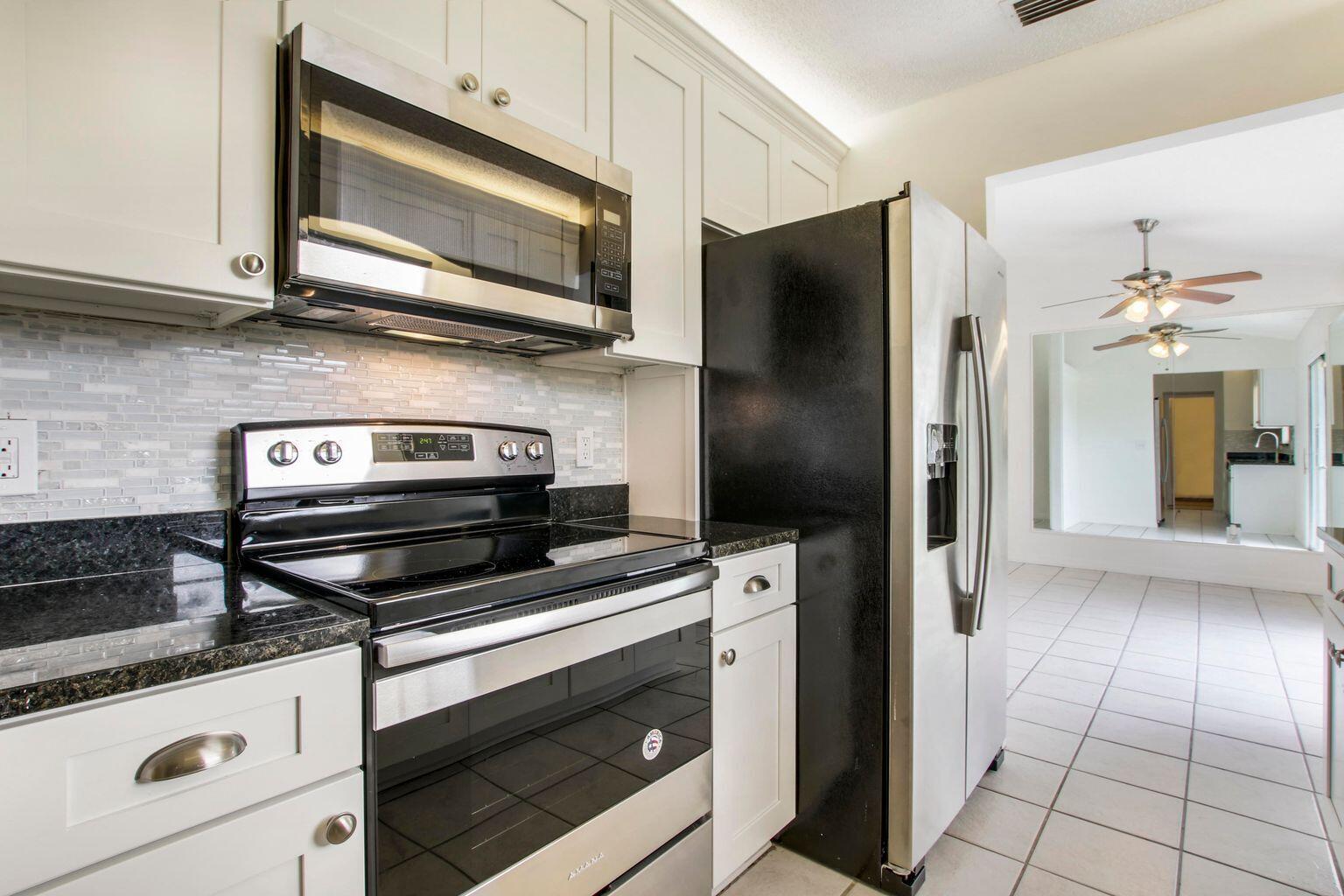 867 Southwest Andrew Road Port St. Lucie, FL 34953 - Photo 4 of 9 Andrew 2