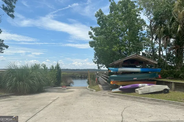 a view of a car parked in front of a house