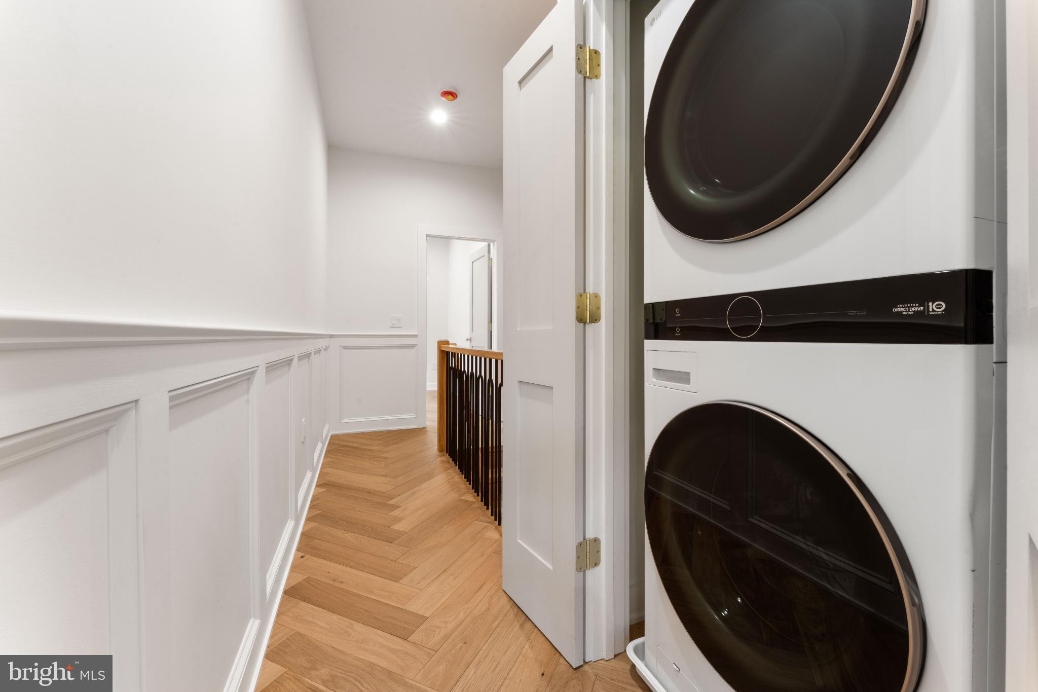 823 Mercer Street Philadelphia, PA 19125 - Photo 21 of 37 a view of a hallway with washer and dryer
