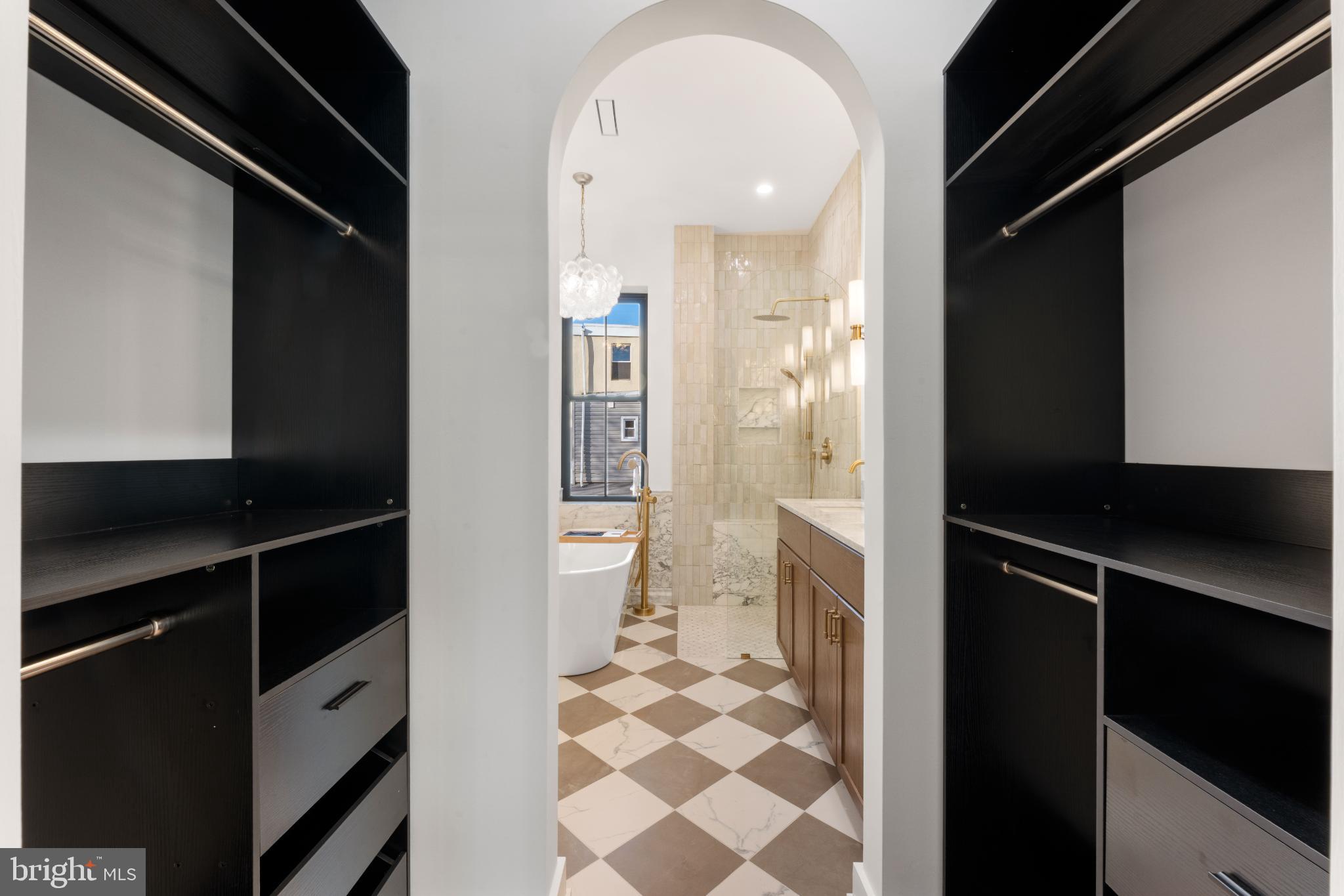 823 Mercer Street Philadelphia, PA 19125 - Photo 26 of 37 a bathroom with a sink a toilet a shower and a mirror