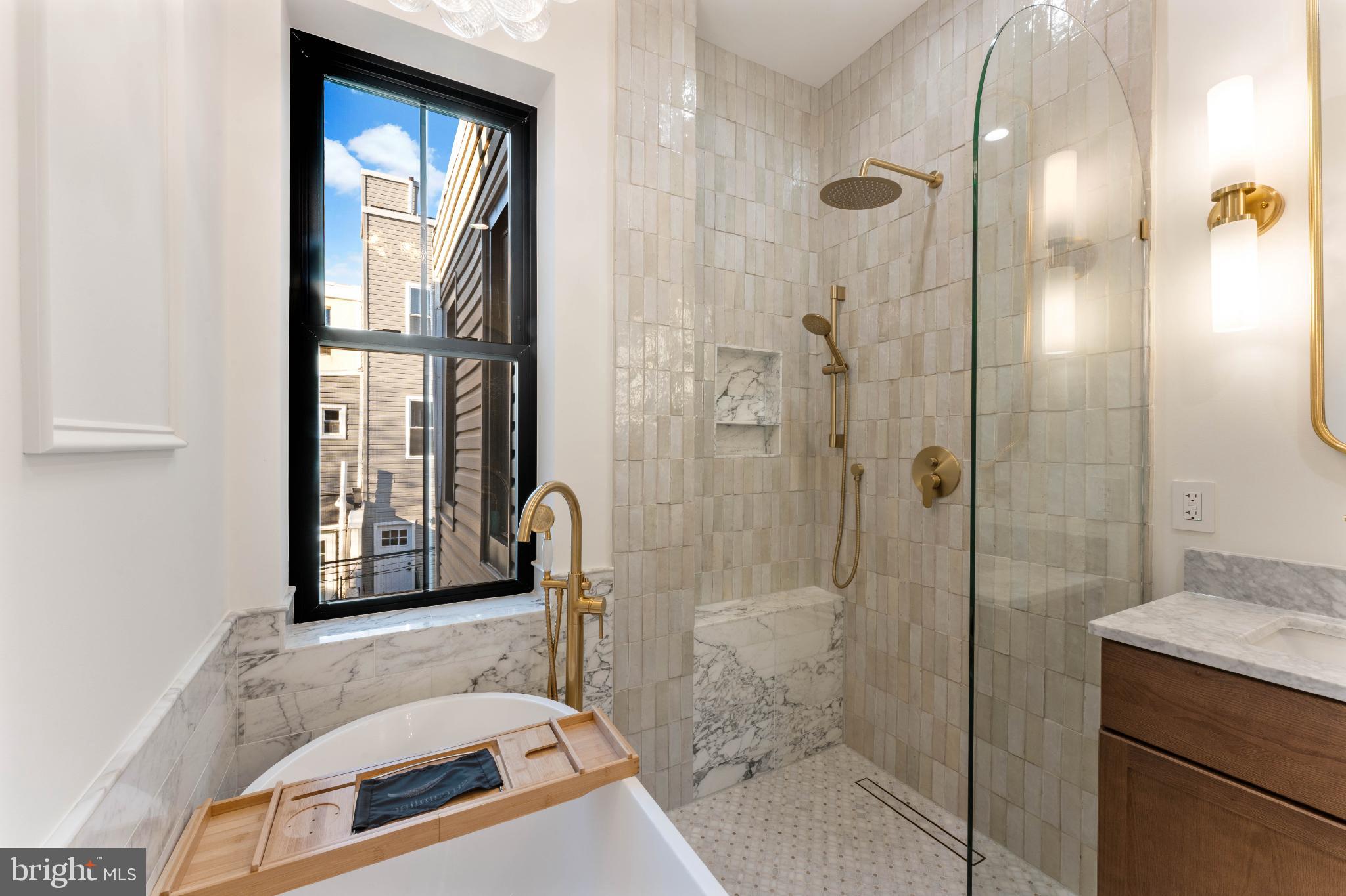 823 Mercer Street Philadelphia, PA 19125 - Photo 29 of 37 a bathroom with a tub and a sink