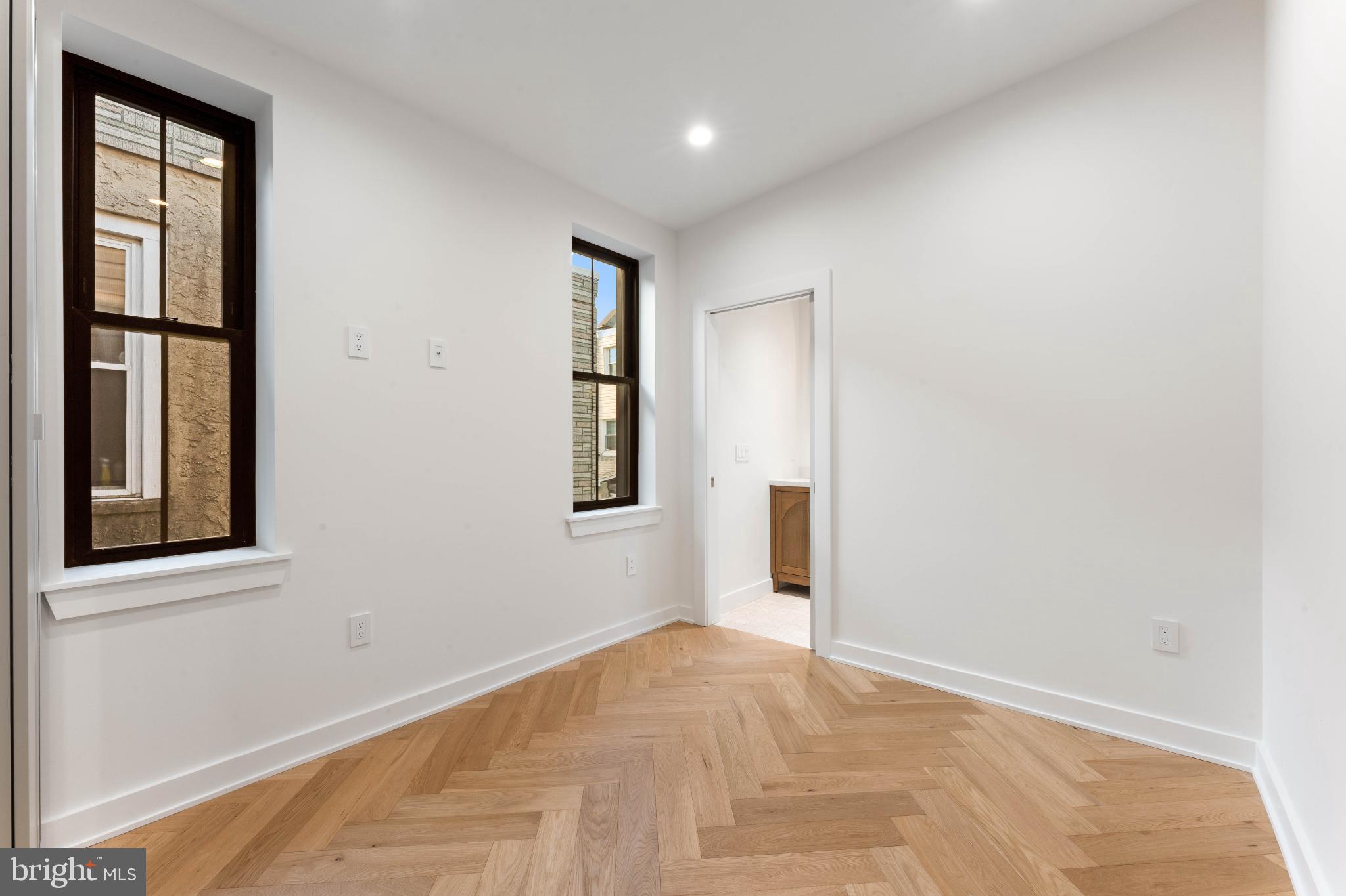 823 Mercer Street Philadelphia, PA 19125 - Photo 31 of 37 a view of an empty room with a window